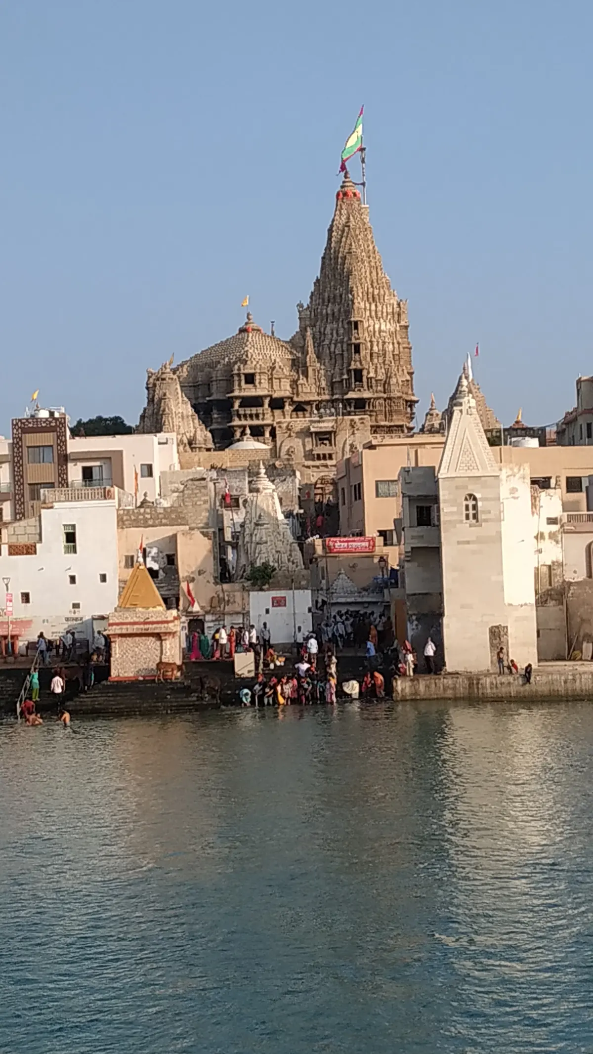Dwarkadhish Temple viewed from Gomti Ghat in Dwarka